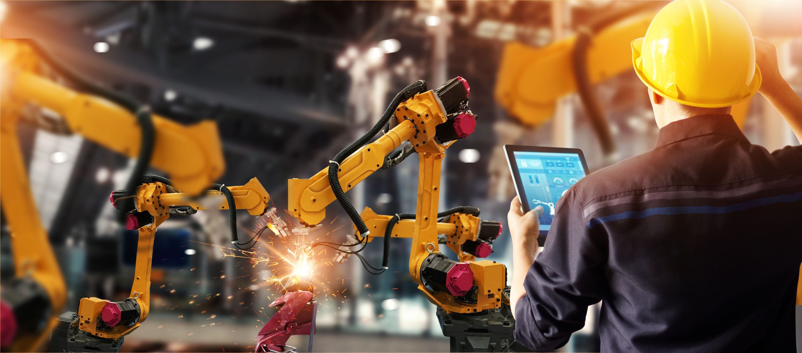 Engineer check and control welding robotics automatic arms machi